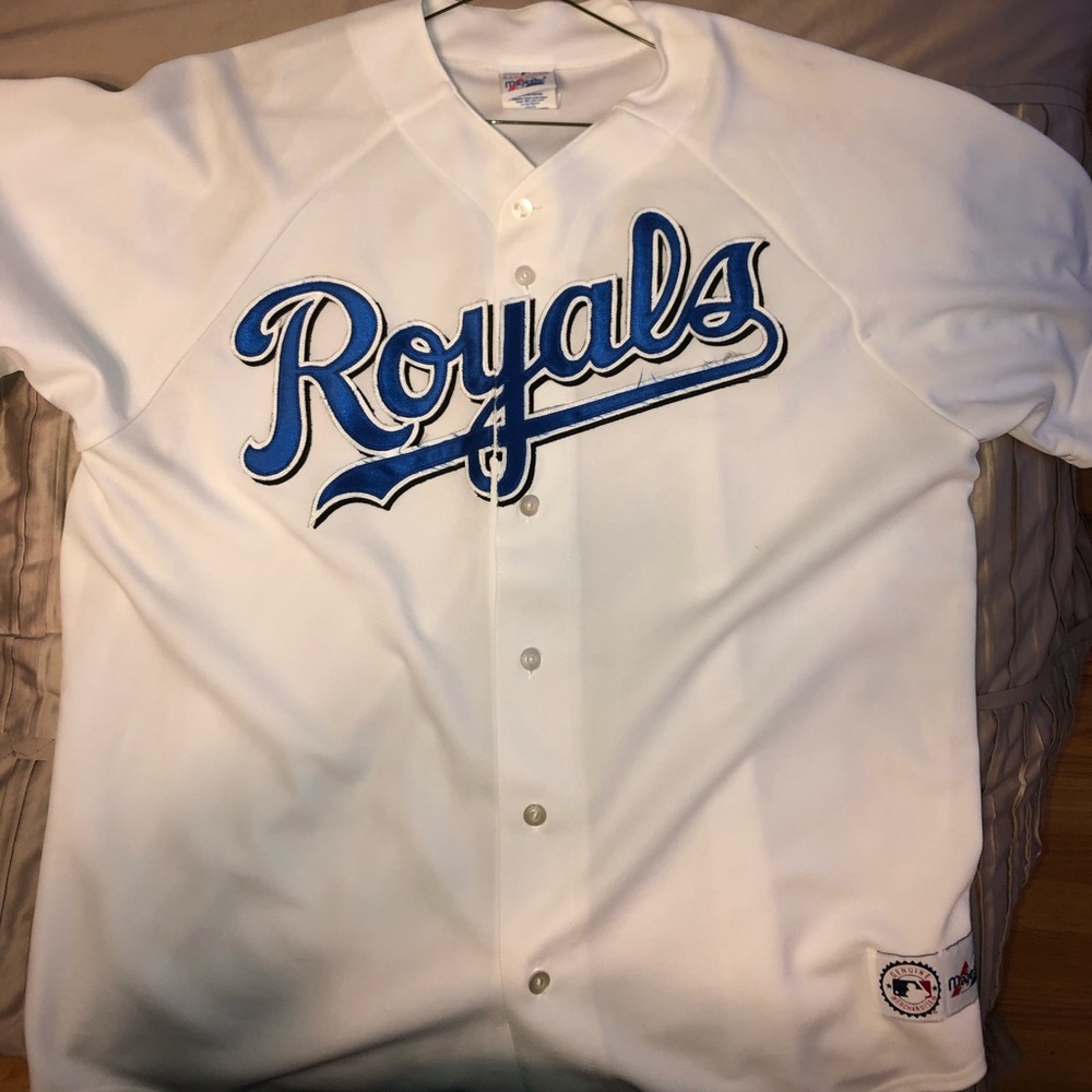 KC Royals baseball jersey.